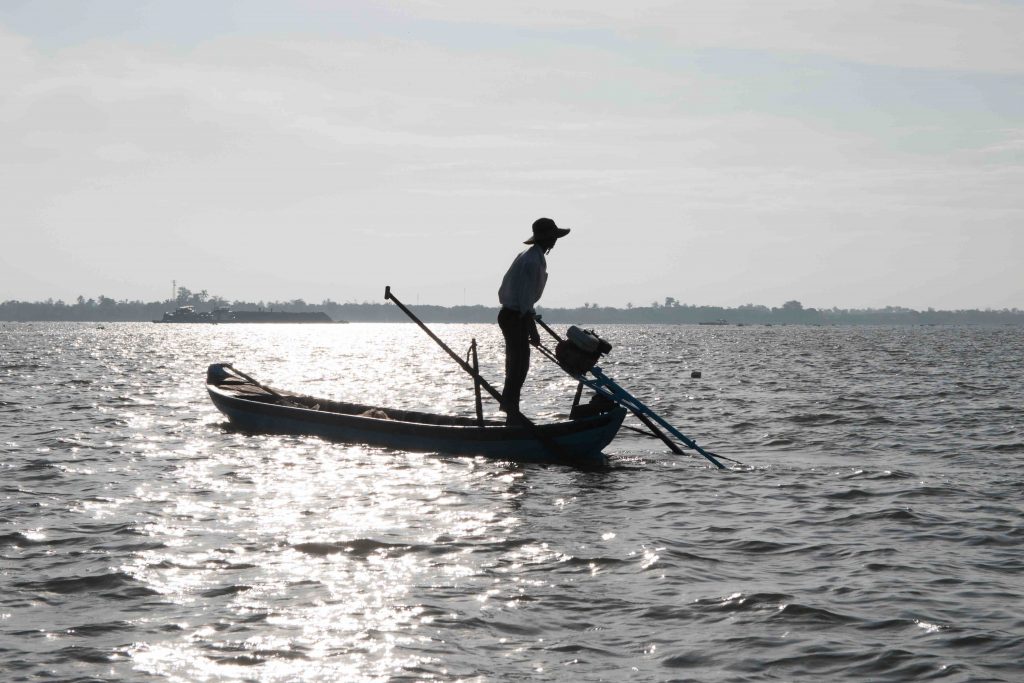 fisherman on the river of the Mekong to the Viet Nam
