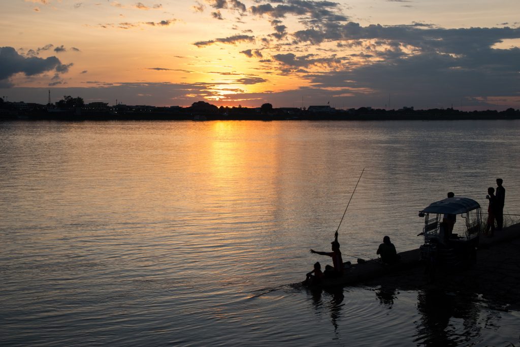 Sunset over the Mekong to Thakhek in Laos
