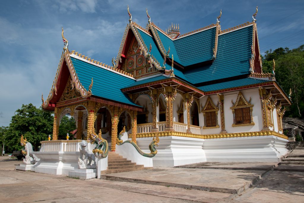 Buddhist temple behind the large Buddha Golden to Pakse in Laos