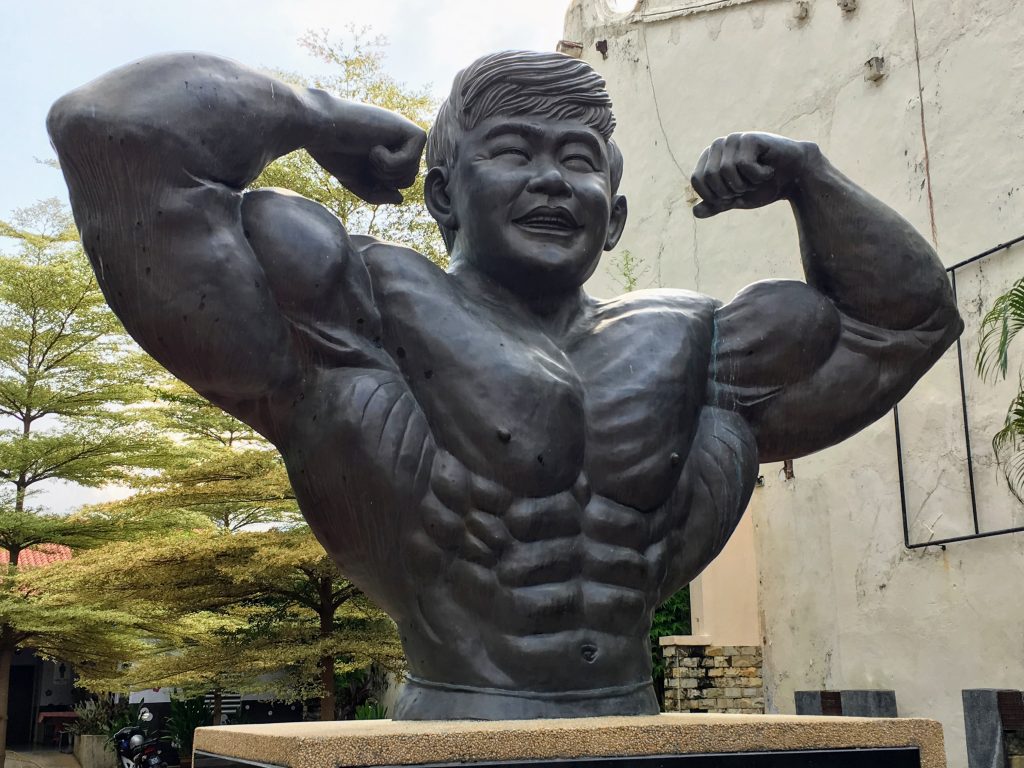 Super Chinese, mister muscle, in the heart of Melaka in Malaysia