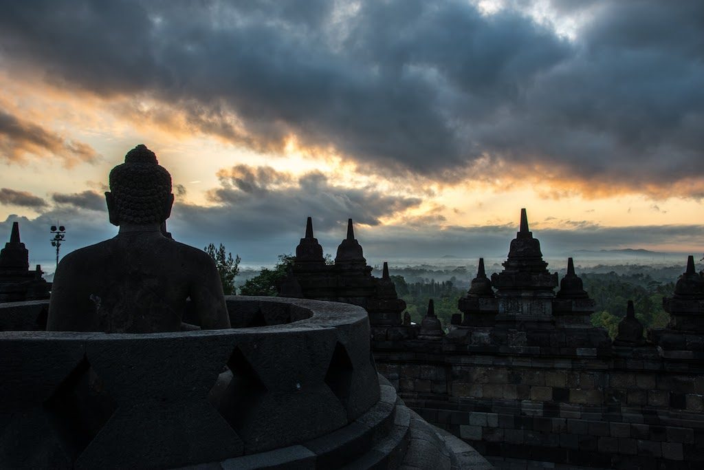 The Buddhas are hidden in stupas, sometimes open, in the complex of Borobudur next to Yogyakarta